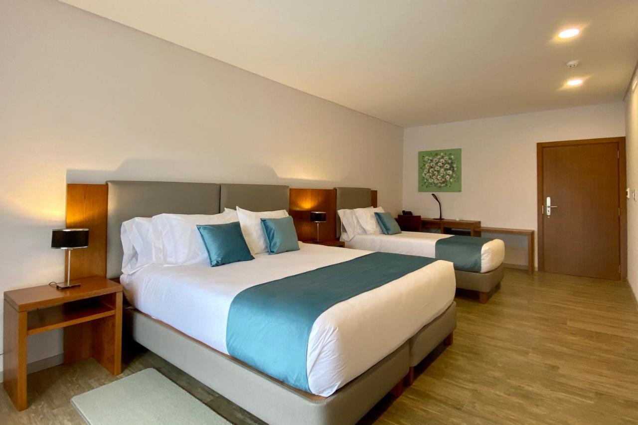 Habitación Triple con balcón
