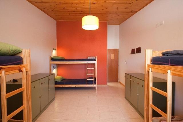 Cama Individual en habitación compartida femenina