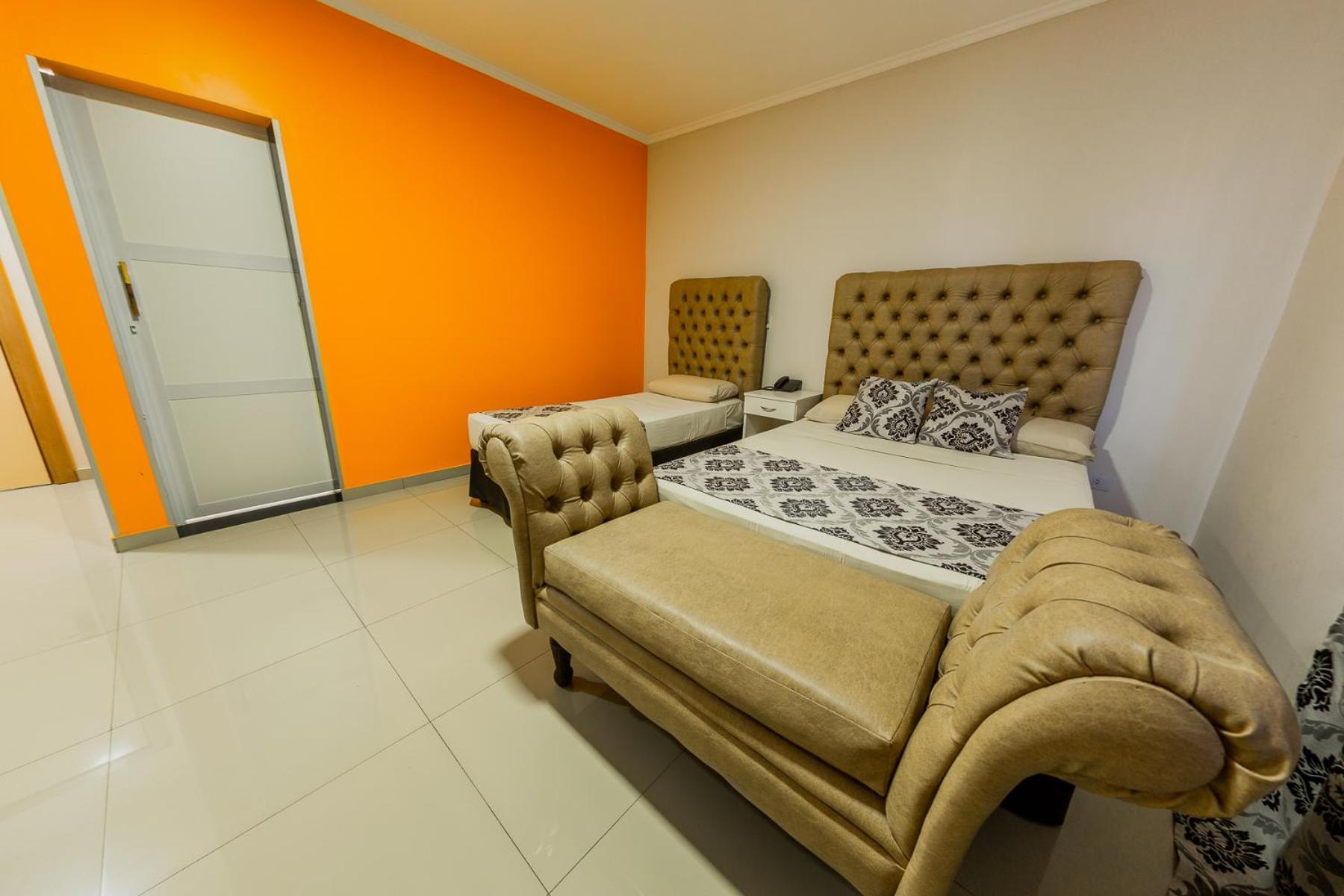 Quarto Triplo com Casa de Banho Privativa
