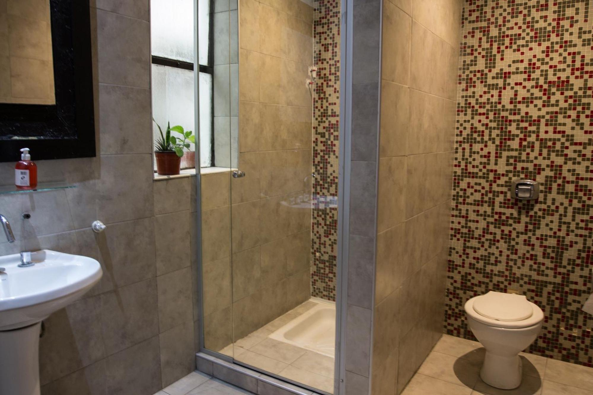 Quarto Triplo com Casa de Banho Privativa