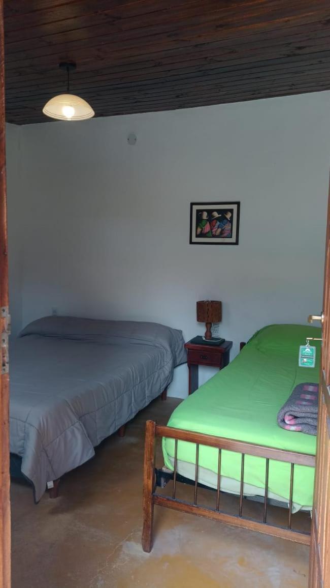 Habitación Triple con vistas al jardín