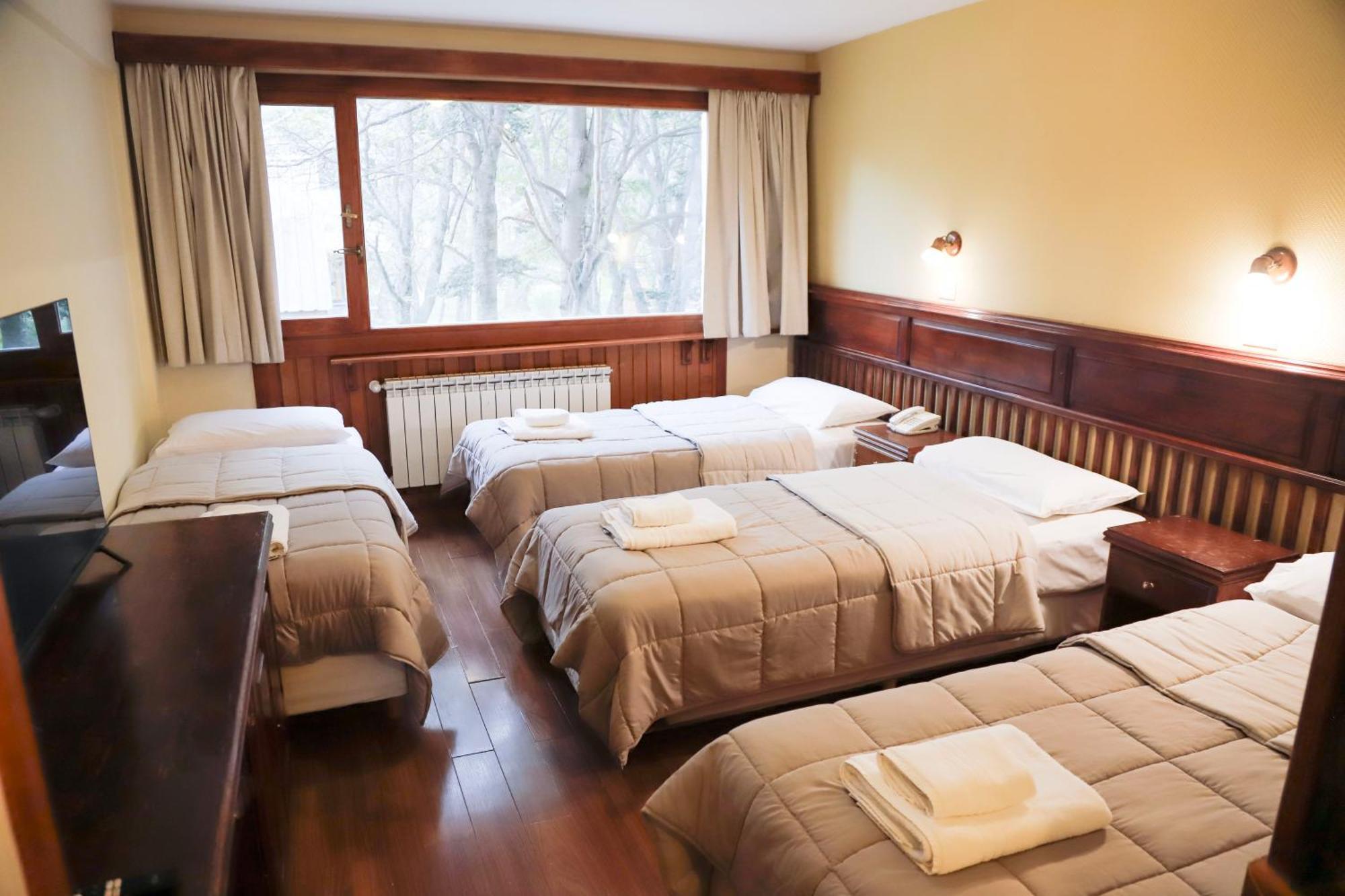 Quarto Quádruplo com Vista Jardim